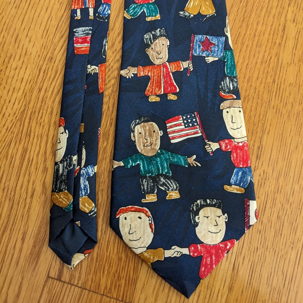 Dino Romaro tie hand made cartoon figures cultures ethnicities joining together